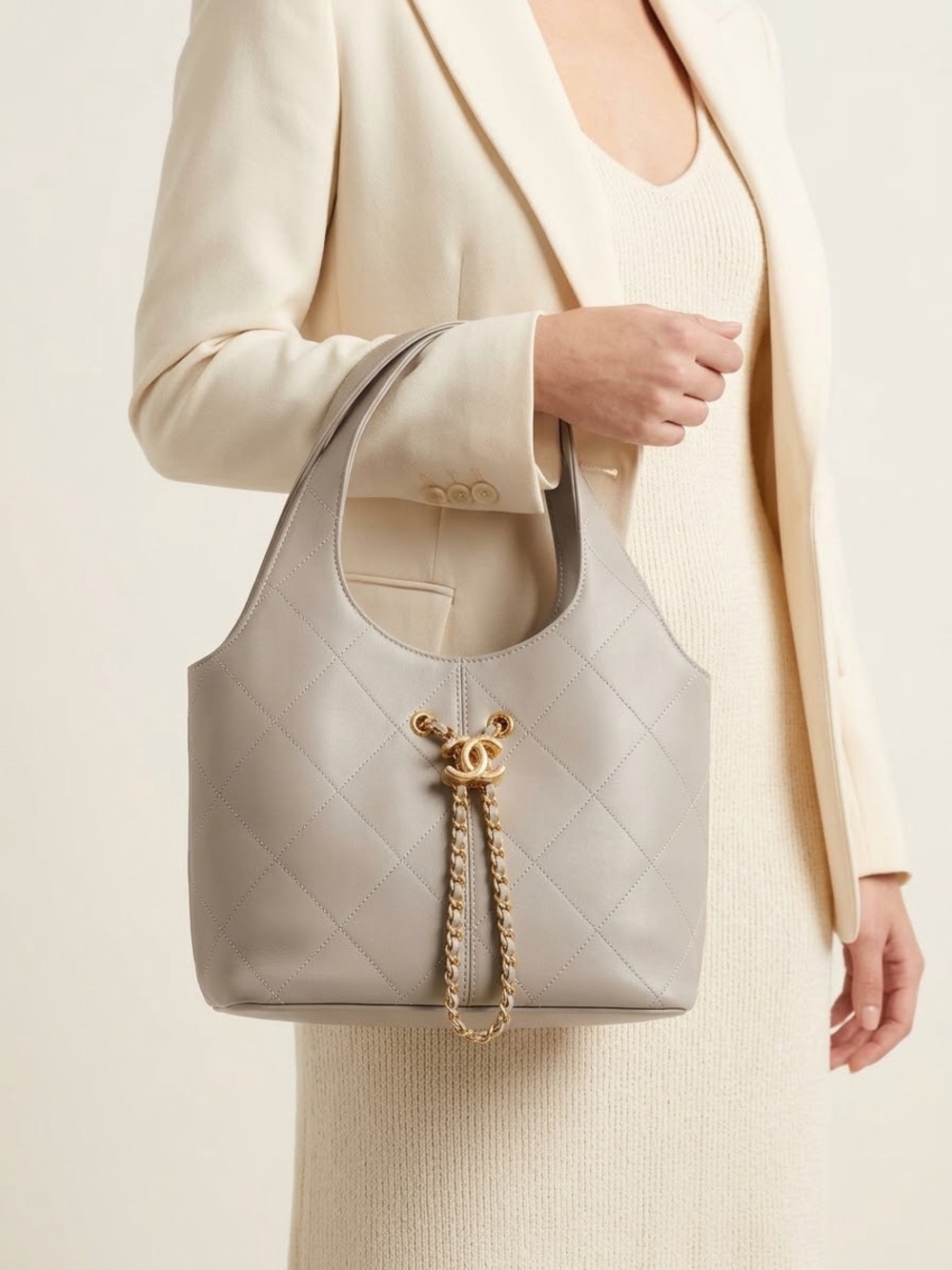 Quilted Taupe Hobo with Gold Chain Accents very unique and sleek